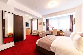 Отель Bucur Accommodation Бухарест King Double with Balcony (Including smoking area)-5